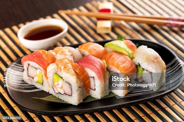 Set Of Rainbow Uramaki Sushi Rolls With Avocado Stock Photo - Download Image Now - Sushi, Rainbow, Maki Sushi