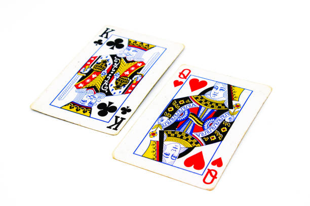 istock Playing cards isolated on white background with selective focus 1354367431