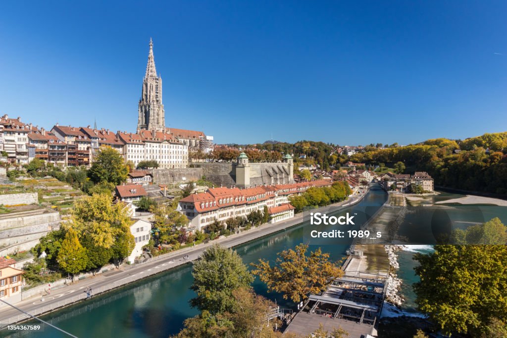 Bern cathedral The cathedral of Bern or Munster along side of Aare river in sunny day, Switzerland tourism Bern Stock Photo