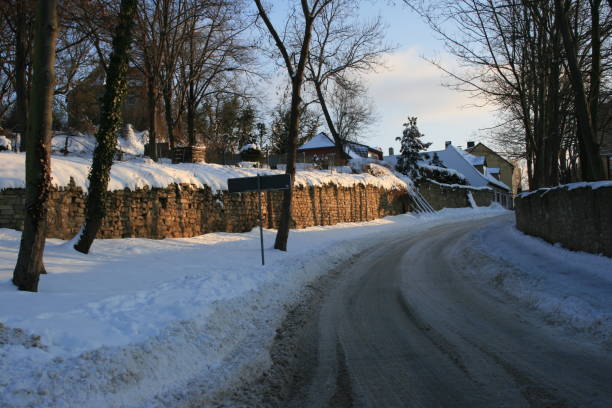 istock white snow in the city park 1354374939