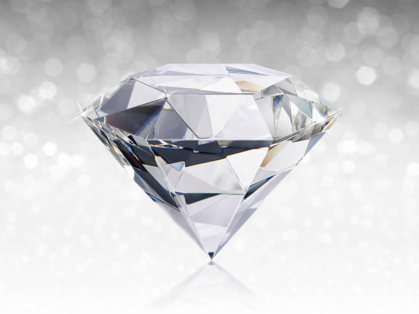istock Dazzling diamond on white shining bokeh background. concept for chossing best diamond gem design 1354375575