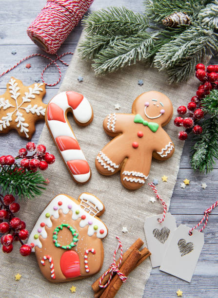 istock Christmas gingerbread cookies on dark background 1354380728