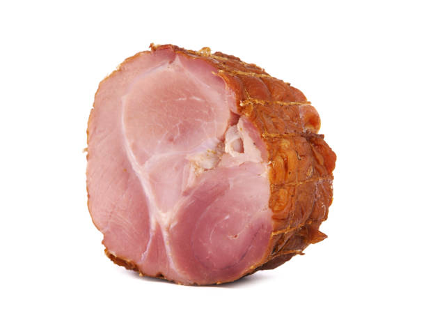 istock Rolled pork meat, dried and smoked, isolated on white 1354381690