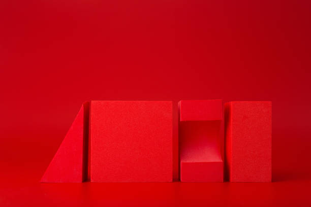 istock Abstract futuristic background in monochromatic red colors with copy space. Different geometric shapes 1354382938