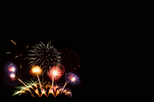 istock colorful new year holiday fireworks with copy space 1354383111