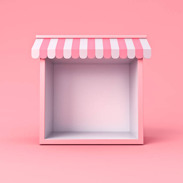 Blank sweet exhibition booth store or blank display shop stand with pink striped awning isolated on pink pastel color background minimal conceptual stock photo
