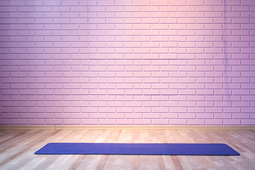 Empty room background wooden floor pink brick wall fit mat