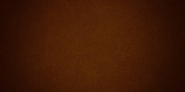 istock Dark red abstract grunge background color, light canter spotlight, faint orange vintage background 1354390696