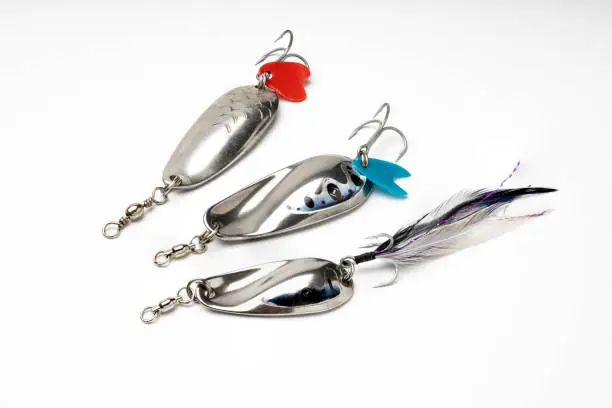 Photo of Artificial baits for catching of the predatory fishes on white background