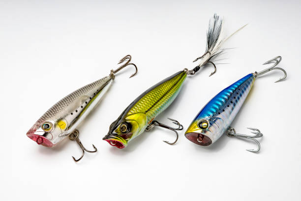 Artificial baits for catching of the predatory fishes on white background