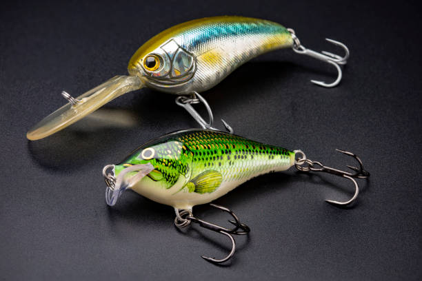 istock Artificial baits for catching of the predatory fishes on black background 1354393615