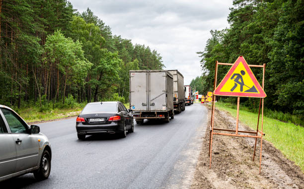 korek, prace naprawcze na drodze - avtovaz zdjęcia i obrazy z banku zdjęć