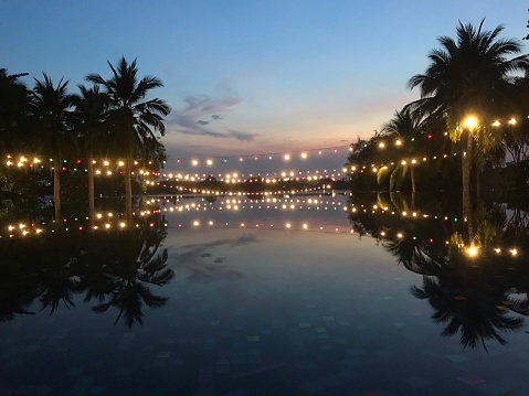 Palma de Mallorca, Spain; march 29 2024: Bright facade of the Sant Jordi hotel in the tourist resort of Playa de Palma de Mallorca at night