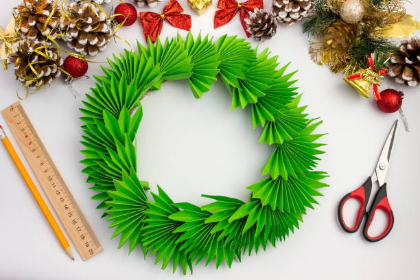 istock Christmas wreath made of colored paper. DIY concept. Handmade at home. Step-by-step instruction. Step 22 1354399355