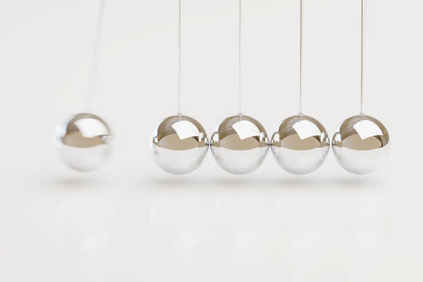 istock Newton's cradle isolated on white. Balance concept. 3d illustration. 1354400444
