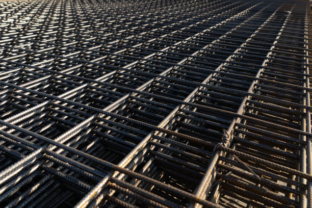 istock The rebar is bonded with steel wire for use as a construction infrastructure. Which part of the rebar has rusted due to chemical reactions. 1354400692