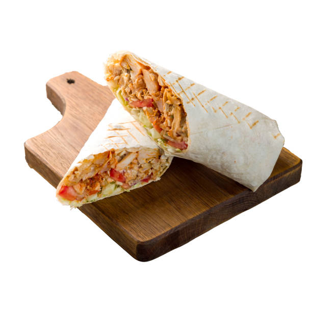 istock roll with chicken and vegetables on the Board, shaurma, shwarm, shwarma 1354404388