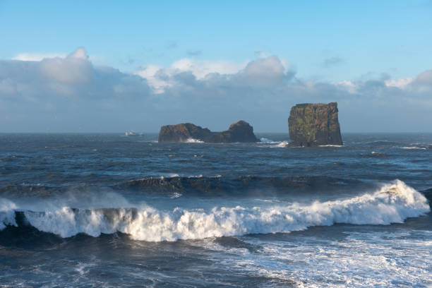 istock View from cape Dyrholaey, Iceland. Stormy sunrise 1354408195