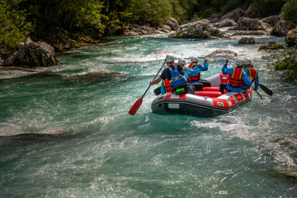 istock Raft with group of people calmly floating on turquoise water 1354408327