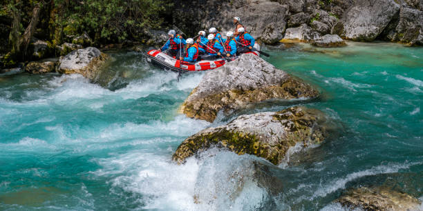 istock Adrenaline activity in nature, riding down boiling water rapids in raft 1354408338