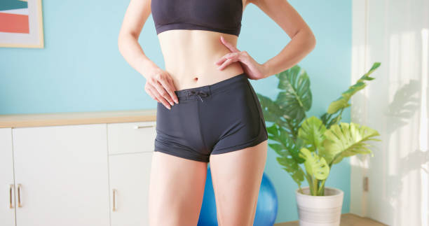 istock Woman show her body shape 1354410333