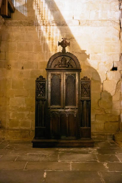 old confessional in a church in spain - confession booth imagens e fotografias de stock