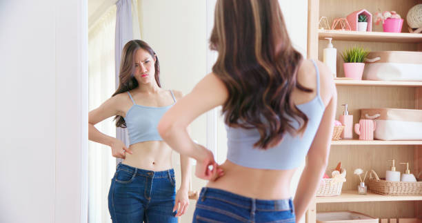 istock asian beauty look in mirror 1354410534