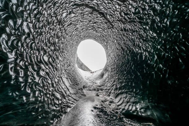 istock Dark blue glacier cave in Iceland 1354410590