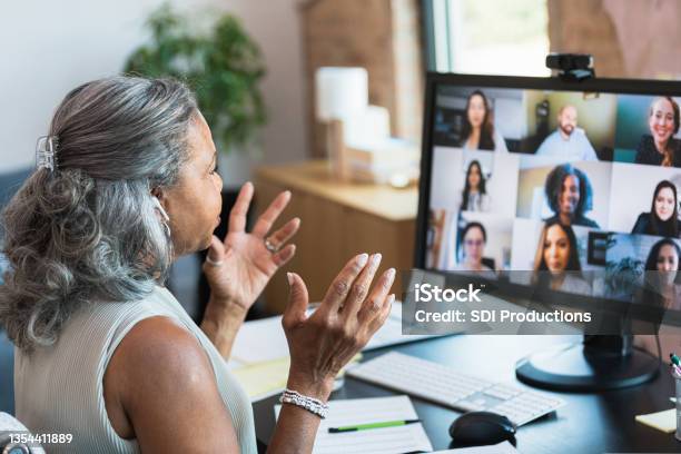 Businesswoman Gestures During Video Call Stock Photo - Download Image Now - Video Call, Video Conference, Working At Home