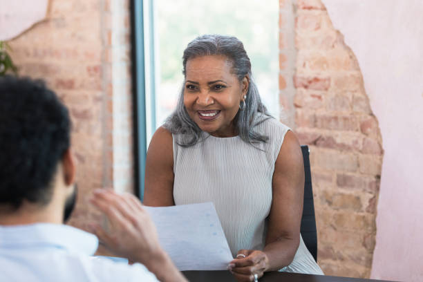 istock Businesswoman interviews potential employee 1354411960