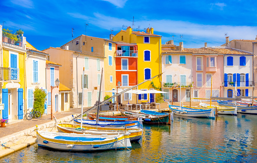 Brightly coloured houses in the traditional streets and famous old harbour of Martigues, Provence, South of France