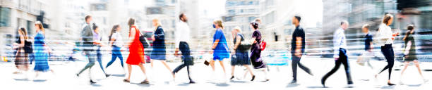 lots of walking people, multiple exposure illustration represents modern life in the big busy city. business people, young people, students crossing the road - crossing people panoramic road imagens e fotografias de stock