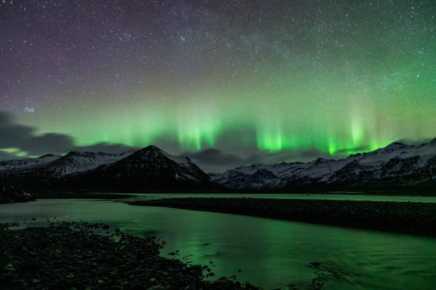 istock Incredible Aurora Borealis activity above the coast in Iceland 1354416465