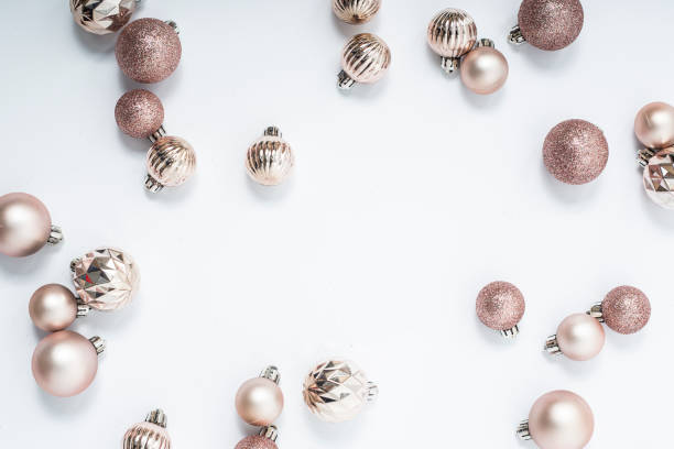istock Beautiful golden decorative balls on a white background. Top view, flat lay. 1354421211