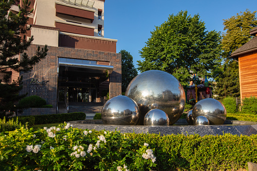 Truskavets, Ukraine - July 7, 2021:  Fountain with silver balls in Truskavets, Ukraine