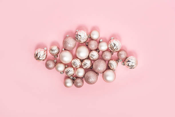 istock Decorative pink balls on a pink background. Top view, flat lay. 1354421568
