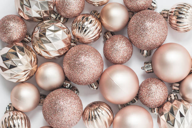istock Beautiful golden decorative balls on a white background. Top view, flat lay. 1354422045
