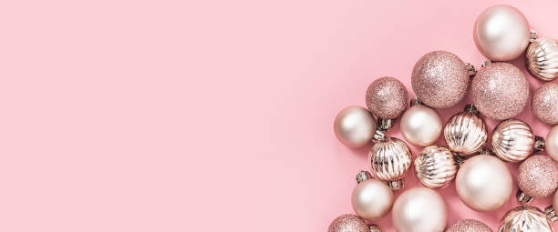 istock Decorative pink balls on a pink background. Top view, flat lay. Banner. 1354422119