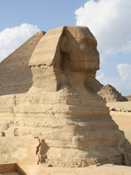 istock Egypt. The Sphinx (side view) and the pyramid of Cheops. 1354426692