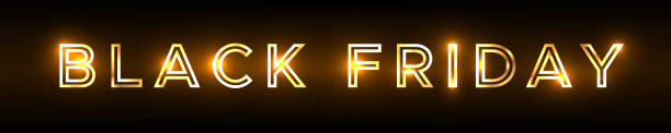 istock Black Friday banner. Shiny golden words Black Friday from a contour on a black background 1354430021