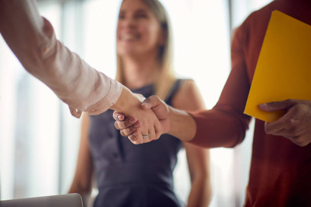 istock Business handshake .Partnership, deal, agreement. 1354446715