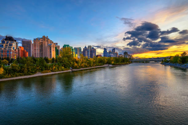 istock Sunset above city skyline of Calgary with Bow River, Canada 1354446814