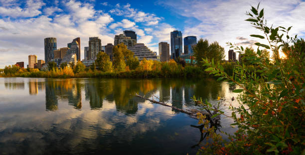 istock Sunset above city skyline of Calgary with Bow River, Canada 1354446824