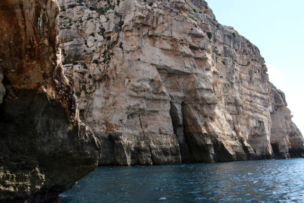 istock Cliffs at the Blue Grotto in Malta 1354448411