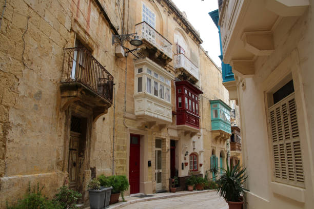 istock Romantic Street in Vittoriosa-Birgu, Malta 1354448503