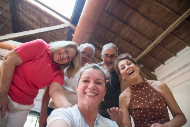 istock Happy group of senior dancers having fun after class in studio 1354448687