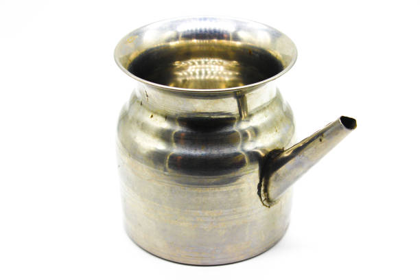 istock Stainless Steel Lota on white background with selective focus 1354452222