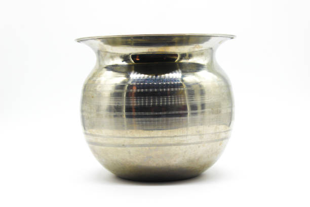 istock Stainless Steel Lota on white background with selective focus 1354452301