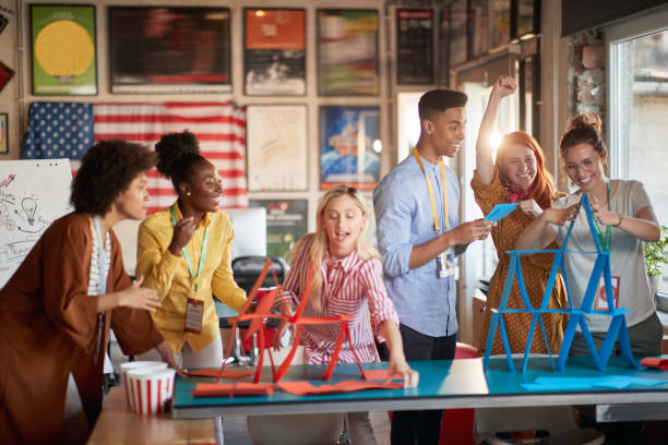 istock Group of young creative people is playing during a break in the office 1354463335