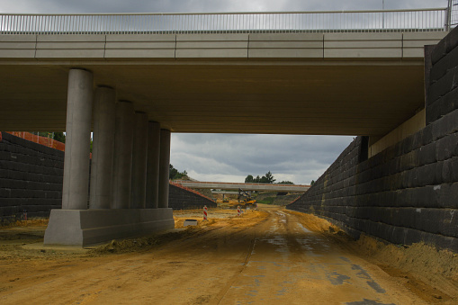 Nuth, the Netherlands, - July 24, 2015. Making a drainage system in the lower section of a new highway.